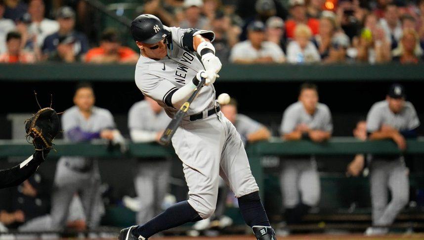 Aaron Judge swinging bat during game