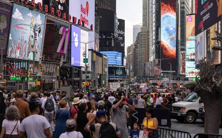 Crowded Times Square at night