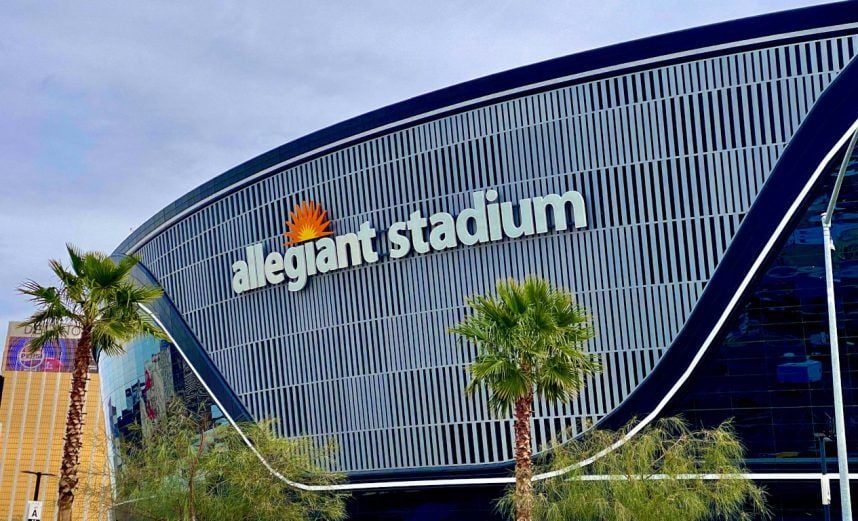 Allegiant Stadium with palm trees