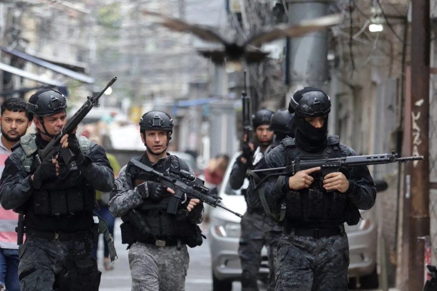 Brazilian soldiers patrolling with rifles